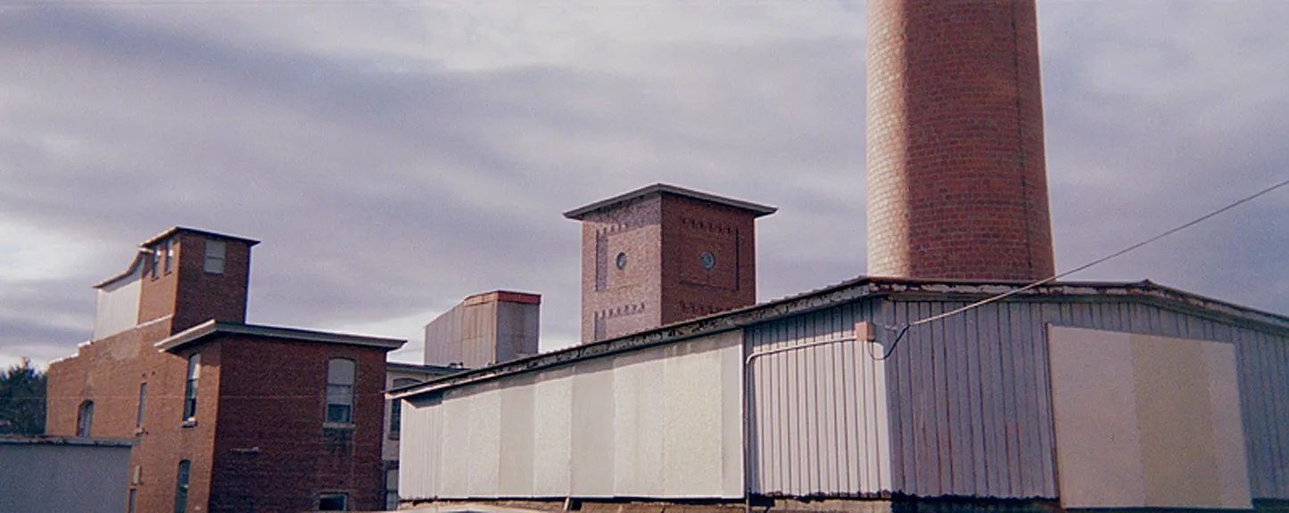 Saxonville Mills - a photograph by Willard Traub.